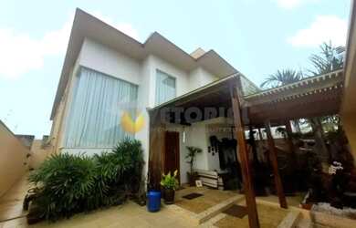 Imagem: A casa possui 5 Dormitórios, 5 Banheiros, 406m² de Área e