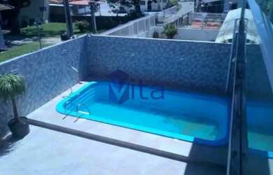 Imagem: A casa possui 5 Dormitórios, 3 Banheiros, 3 Vagas na garagem