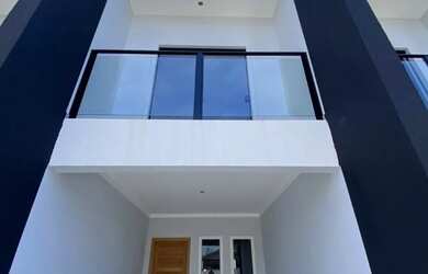 Imagem: A casa possui 2 Dormitórios, 3 Banheiros, 2 Vagas na garagem