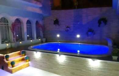 Imagem: A casa possui 3 Dormitórios, 2 Banheiros, 1 Vaga na garagem