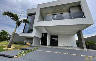 Imagem: A casa possui 3 Dormitórios, 1 Banheiro, 2 Vagas na garagem