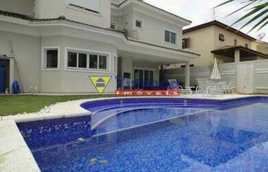 Imagem: A casa em condomínio possui 4 Dormitórios, 4 Banheiros, 3