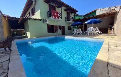 Imagem: A casa possui 5 Dormitórios, 5 Vagas na garagem e está localizado