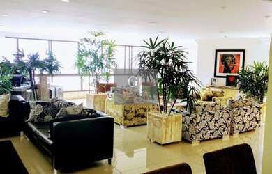 Imagem 1: 4 suites com vista total mar. 4 vagas de garagens e armários