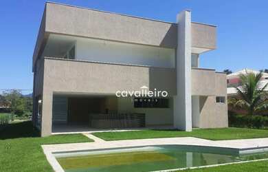 Imagem: A casa em condomínio possui 5 Dormitórios, 5 Banheiros, 2