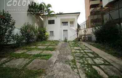 Imagem: A casa possui 5 Dormitórios, 3 Banheiros, 5 Vagas na garagem