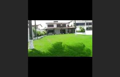 Imagem: A casa possui 5 Dormitórios, 2 Banheiros, 4 Vagas na garagem