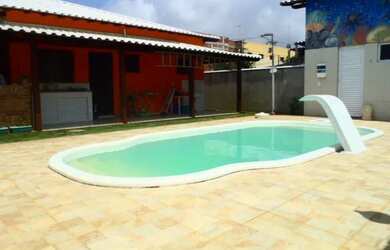 Imagem: A casa possui 4 Dormitórios, 1 Banheiro, 3 Vagas na garagem