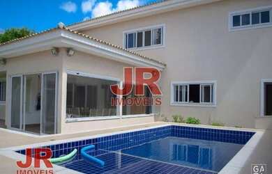 Imagem: A casa possui 5 Dormitórios, 1 Banheiro, 2 Vagas na garagem