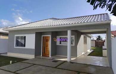 Imagem: A casa possui 3 Dormitórios, 3 Banheiros, 3 Vagas na garagem