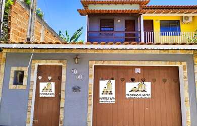 Imagem: A casa possui 2 Dormitórios, 1 Banheiro, 2 Vagas na garagem