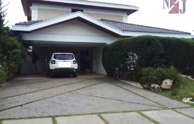 Imagem: A casa em condomínio possui 5 Dormitórios, 5 Banheiros, 4