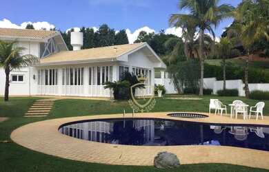 Imagem: A casa em condomínio possui 5 Dormitórios, 5 Banheiros, 5