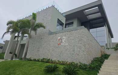 Imagem: A casa em condomínio possui 4 Dormitórios, 5 Banheiros, 4