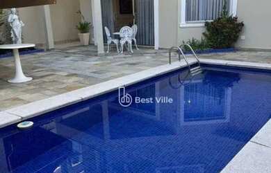 Imagem: A casa em condomínio possui 4 Dormitórios, 5 Banheiros, 4