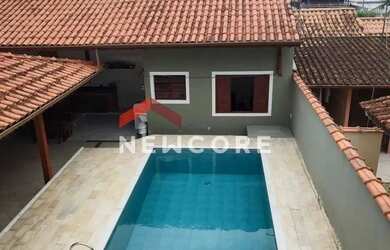 Imagem: A casa possui 4 Dormitórios, 4 Banheiros, 5 Vagas na garagem