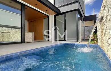 Imagem: A casa possui 3 Dormitórios, 4 Banheiros, 2 Vagas na garagem