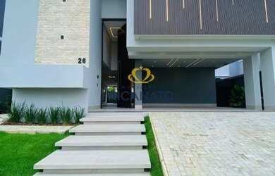 Imagem: A casa possui 4 Dormitórios, 5 Banheiros, 2 Vagas na garagem