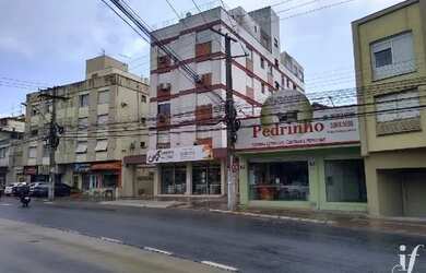 Imagem: O apartamento possui 1 Dormitório, 1 Banheiro, 1 Vaga na garagem