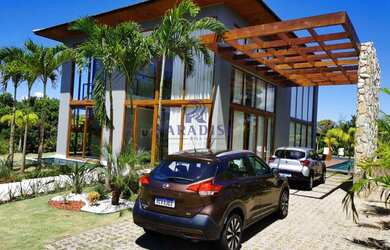 Imagem: A casa possui 5 Dormitórios, 5 Banheiros, 5 Vagas na garagem