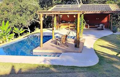 Imagem: A casa em condomínio possui 4 Dormitórios, 5 Banheiros, 5