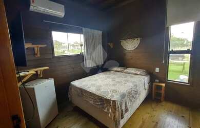 Imagem: A casa possui 3 Dormitórios, 2 Banheiros, 145m² de Área e