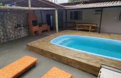 Imagem: A casa possui 3 Dormitórios, 2 Banheiros, 3 Vagas na garagem