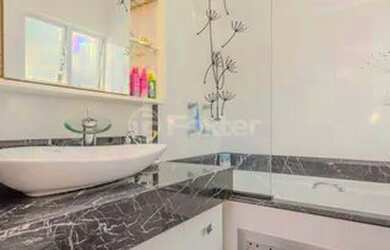 Imagem: A casa em condomínio possui 3 Dormitórios, 3 Banheiros, 2