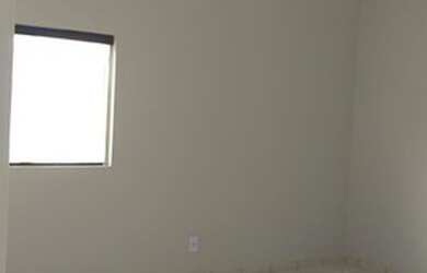 Imagem: A casa possui 3 Dormitórios, 3 Banheiros, 3 Vagas na garagem