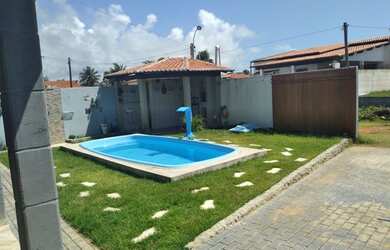 Imagem: A casa possui 2 Dormitórios, 3 Vagas na garagem e está localizado