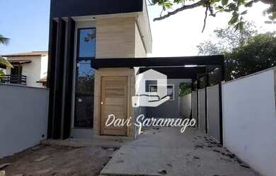 Imagem: A casa possui 3 Dormitórios, 1 Banheiro, 2 Vagas na garagem