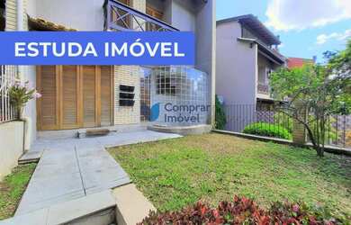 Imagem: A casa em condomínio possui 3 Dormitórios, 3 Banheiros, 2