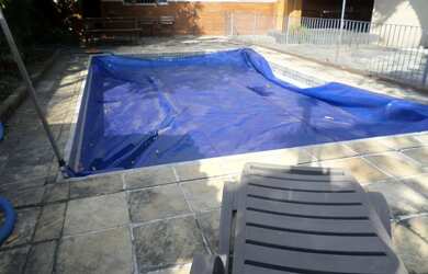 Imagem: A casa possui 4 Dormitórios, 4 Banheiros, 5 Vagas na garagem