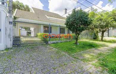 Imagem: A casa possui 5 Dormitórios, 4 Banheiros, 5 Vagas na garagem