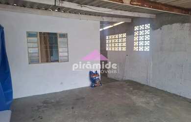 Imagem: A casa possui 2 Dormitórios, 1 Banheiro, 2 Vagas na garagem