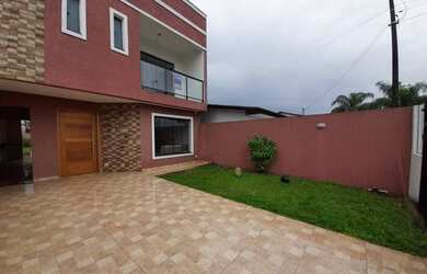 Imagem: A casa possui 3 Dormitórios, 3 Banheiros, 3 Vagas na garagem