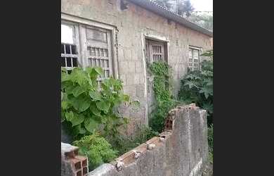 Imagem: A casa possui 2 Dormitórios, 1 Banheiro e está localizado