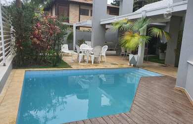 Imagem: A casa possui 5 Dormitórios, 5 Banheiros, 3 Vagas na garagem