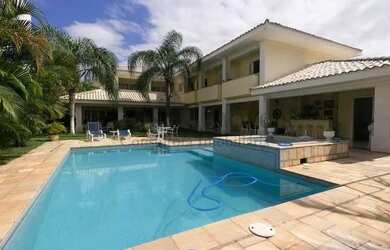 Imagem: A casa possui 4 Dormitórios, 2 Banheiros, 3 Vagas na garagem