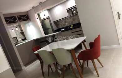 Imagem: O apartamento possui 3 Dormitórios, 1 Banheiro, 2 Vagas na