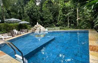 Imagem: A casa em condomínio possui 4 Dormitórios, 4 Banheiros, 2