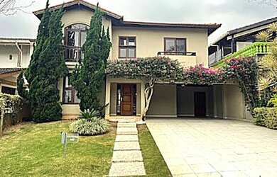 Imagem: A casa em condomínio possui 4 Dormitórios, 4 Banheiros, 4