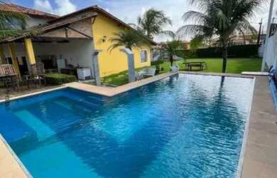 Imagem: A casa possui 5 Dormitórios, 5 Vagas na garagem e está localizado