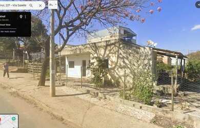 Imagem: A casa possui 4 Dormitórios, 2 Banheiros, 3 Vagas na garagem