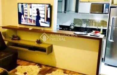 Imagem: O apartamento possui 3 Dormitórios, 1 Banheiro, 1 Vaga na garagem