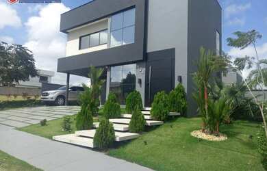 Imagem: A casa em condomínio possui 5 Dormitórios, 5 Banheiros, 5