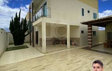 Imagem: A casa possui 3 Dormitórios, 4 Banheiros, 4 Vagas na garagem