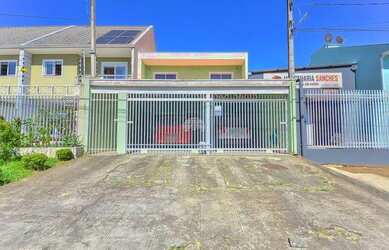 Imagem: A casa possui 4 Dormitórios, 2 Banheiros, 2 Vagas na garagem