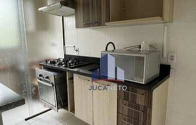 Imagem: O apartamento possui 2 Dormitórios, 1 Banheiro, 1 Vaga na garagem