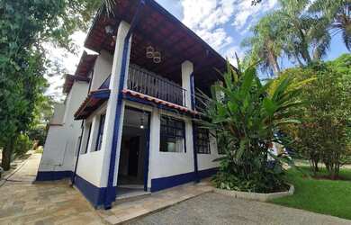 Imagem: A casa possui 5 Dormitórios, 5 Banheiros, 5 Vagas na garagem